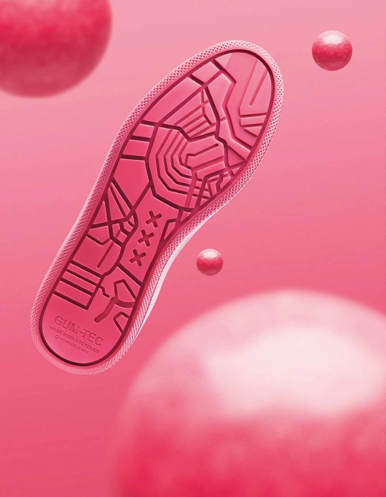Publicis One campaign artwork: pink underside with map-like tread, three crosses and GUM-TEC lettering